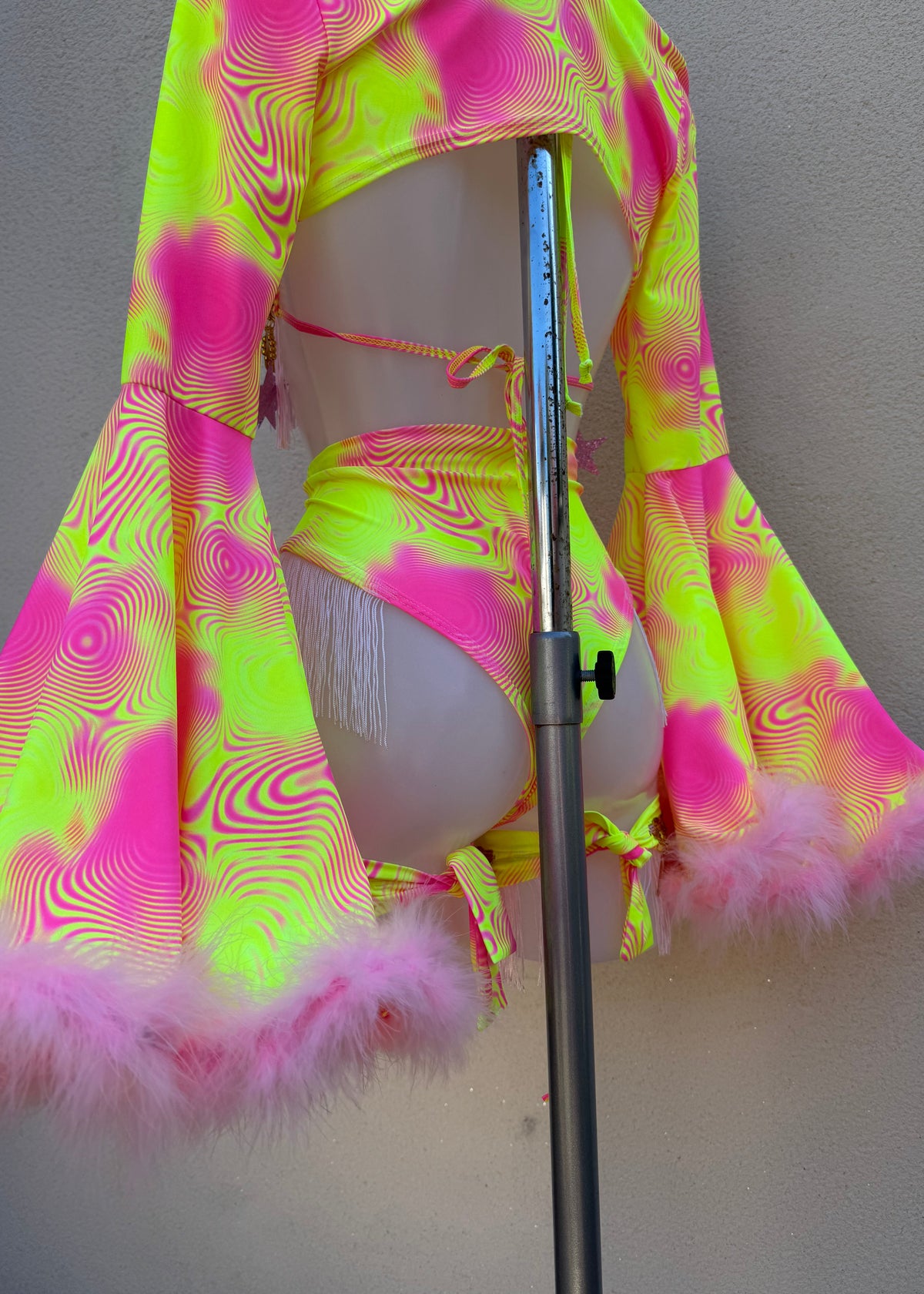 Neon Pink and Yellow Festival Outfit with Star Fringed Accessories and Floof Shrug