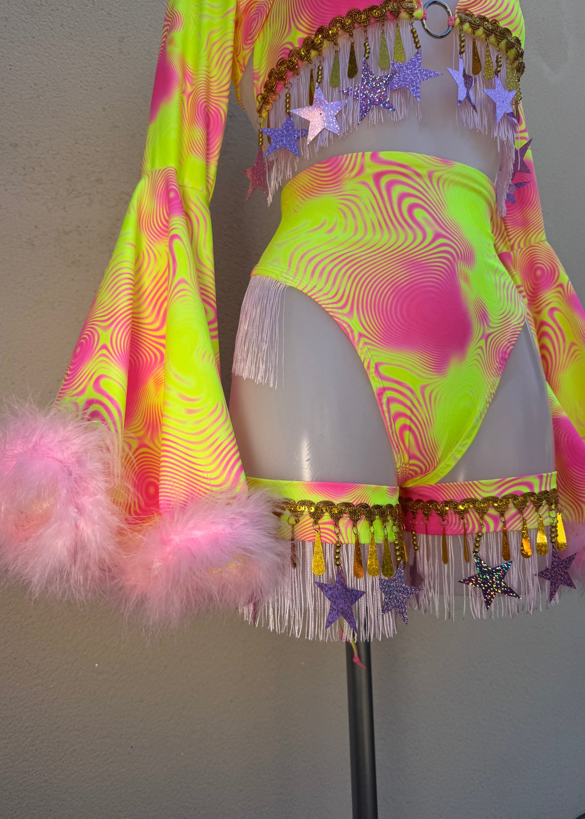 Neon Pink and Yellow Festival Outfit with Star Fringed Accessories and Floof Shrug