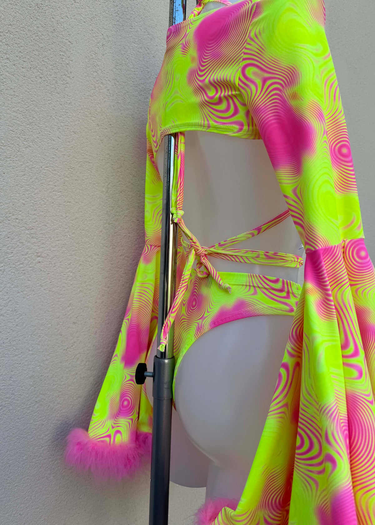Neon Pink and Yellow Swirl Festival Outfit with Fluffy Shrug